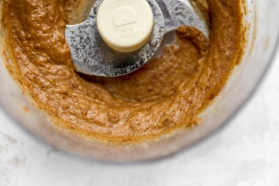 Date caramel in a food processor after being processed.