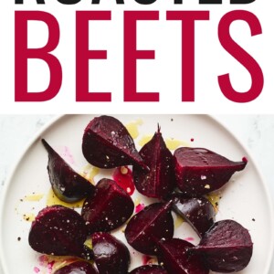 An overhead photo of a plate of quartered roasted beets.