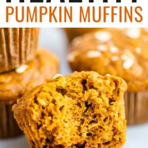 Pumpkin muffins with a bite taken out of it.