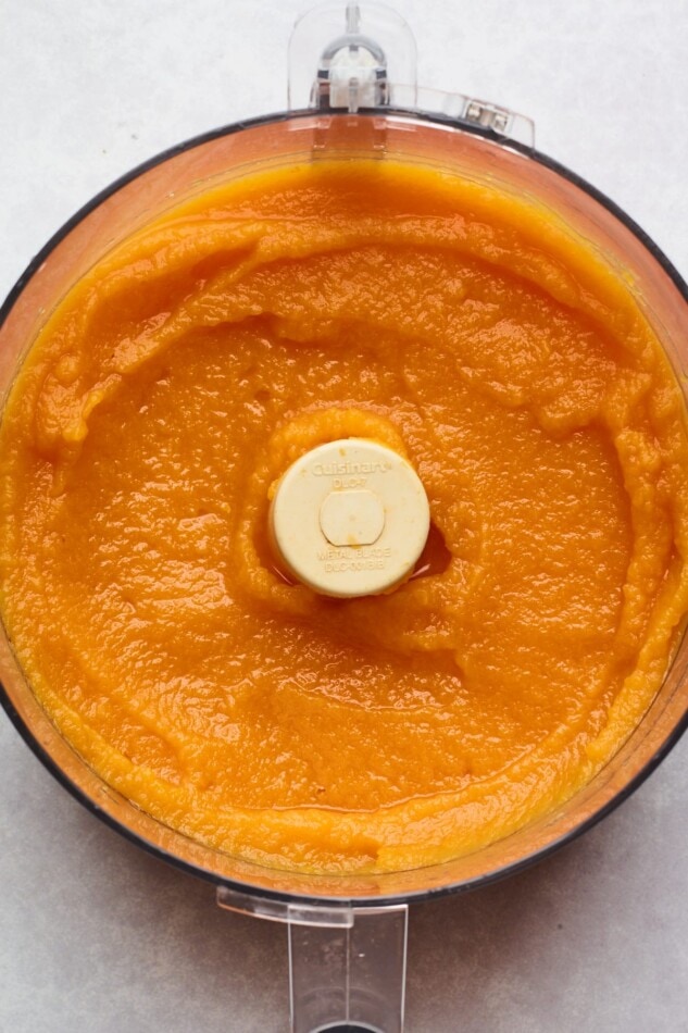 Freshly blended butternut squash puree in a food processor.