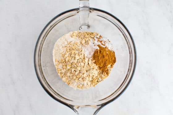 Flour, oats, pumpkin pie spice, baking soda and salt in a medium mixing bowl.