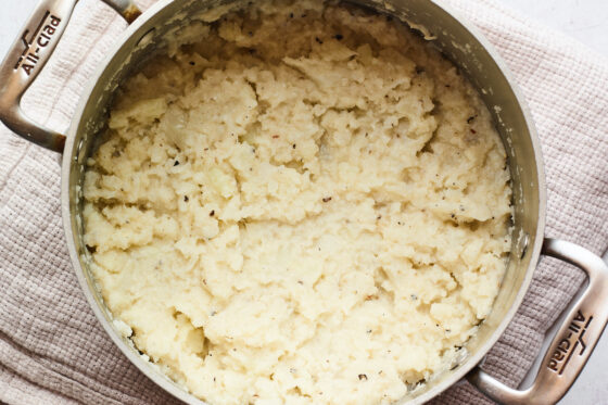 Mashed cauliflower in a large pot.