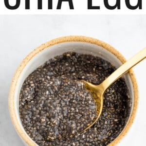 Small bowl with a chia seed egg and a gold spoon.