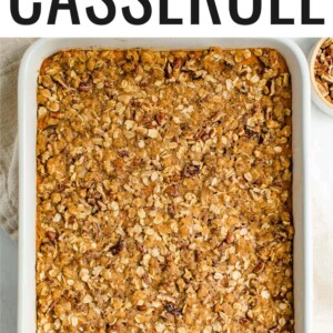 Overhead view looking at a rectangular baking dish containing healthy sweet potato casserole topped with a crunchy pecan and brown sugar topping.