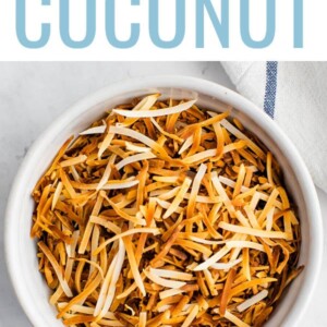 Bowl of toasted coconut flakes.