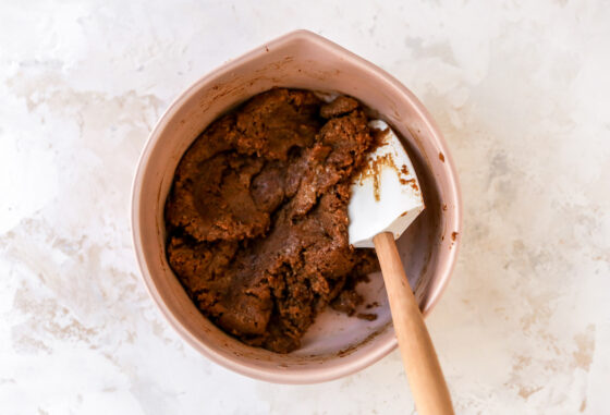 A mixing bowl with almond butter espresso cookie dough.