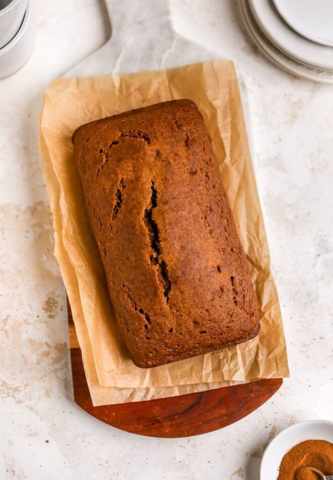 An overhead photo looking down at a gingerbread loaf that has yet to be frosted.