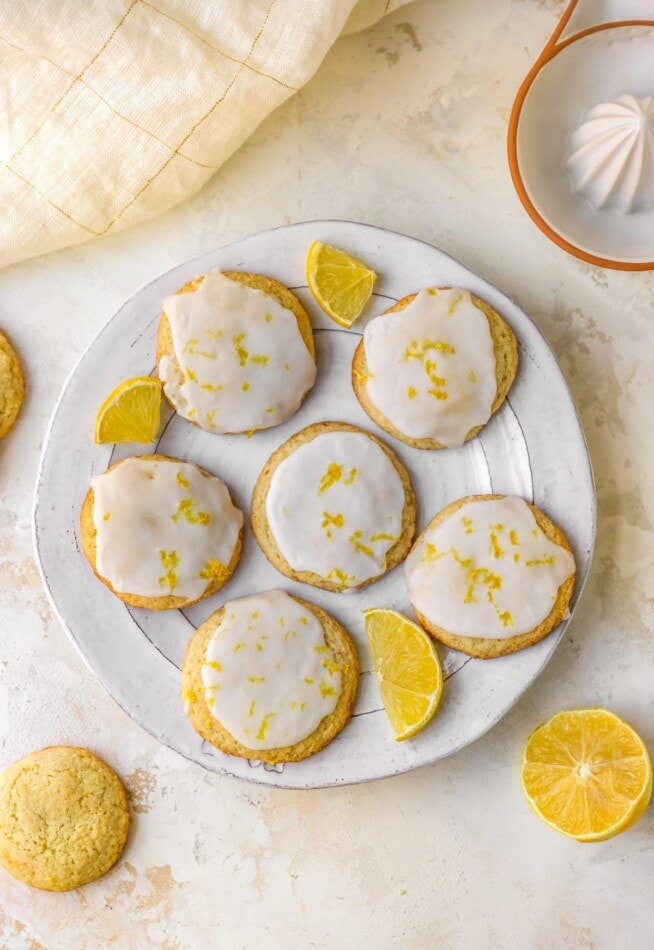 An overhead photo looking down at a plate of lemon almond flour cookies.