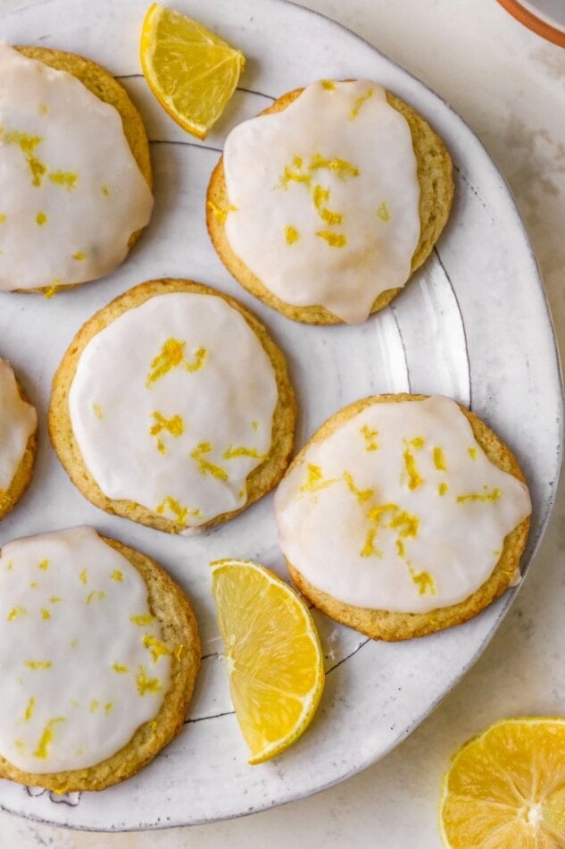 An overhead photo looking down at a plate of lemon almond flour cookies.