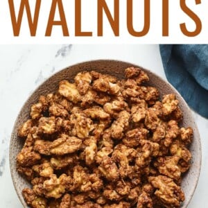 An overhead photo looking at a serving bowl containing candied walnuts.