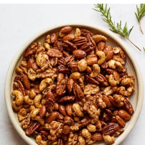 An overhead photo looking at a bowl of sweet and savory party nuts.