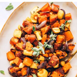 An overhead photo of a serving dish with roasted root vegetables.