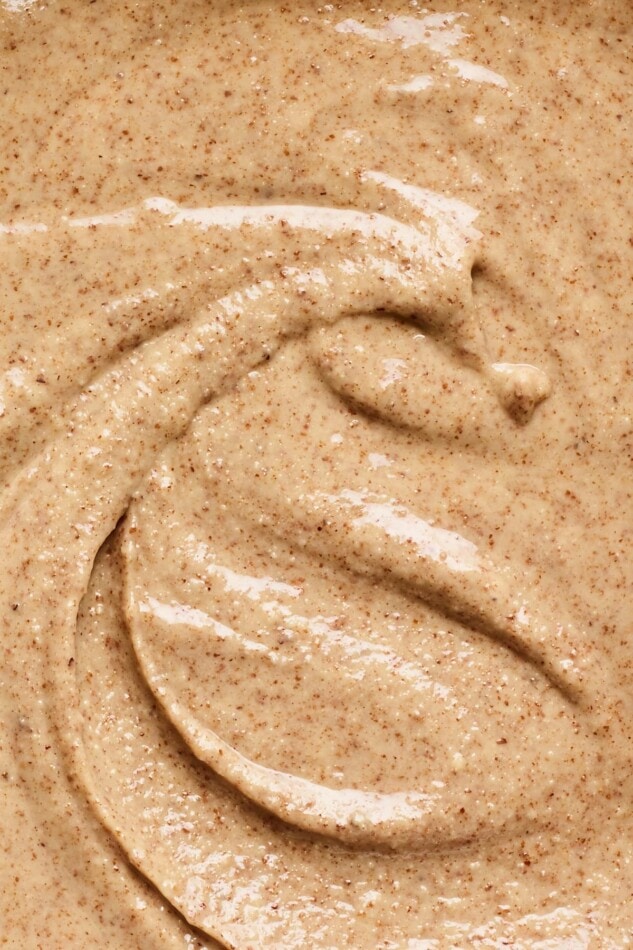 A closeup photo of creamy almond butter.