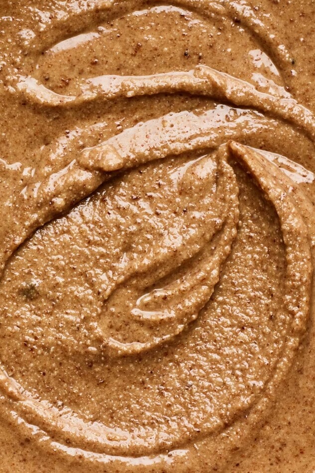 A closeup view of creamy cinnamon raisin almond butter.