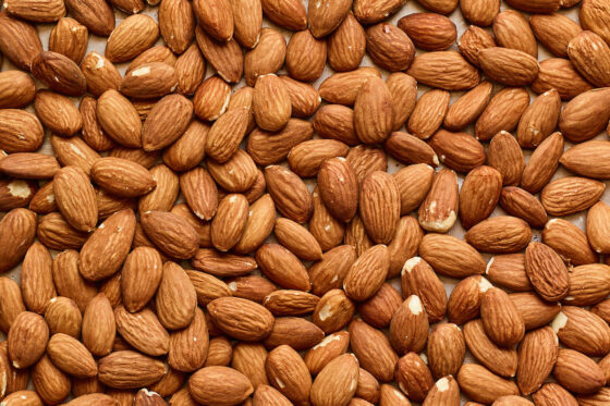 Almonds on a baking sheet.