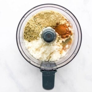 Coconut butter, hemp seeds, vanilla protein powder, maple syrup, water and cinnamon in a food processor.