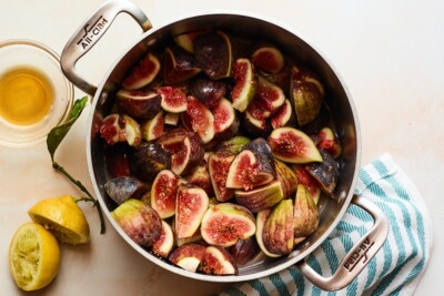 A pot containing sliced figs, to be made into jam.