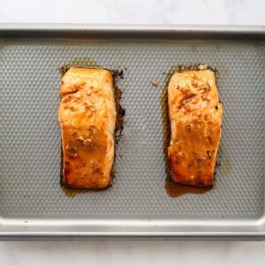 Two broiled maple glazed salmon filets.