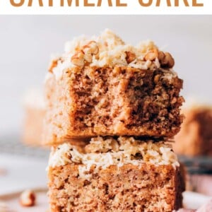 Two pieces of oatmeal cake stacked on top of each other.