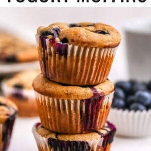 Stack of three yogurt blueberry muffins.