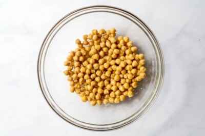 Chickpeas in a glass mixing bowl.