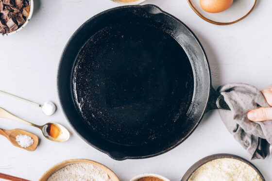A cast iron skillet that has been greased.