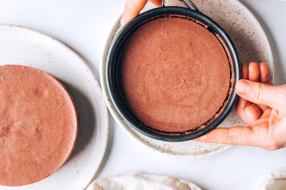 Removing the outer spring form ring from the chocolate tarts.