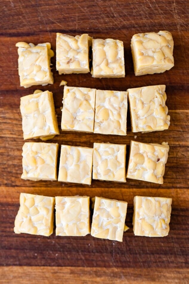 Tempeh square cut into 4x4 cubes.