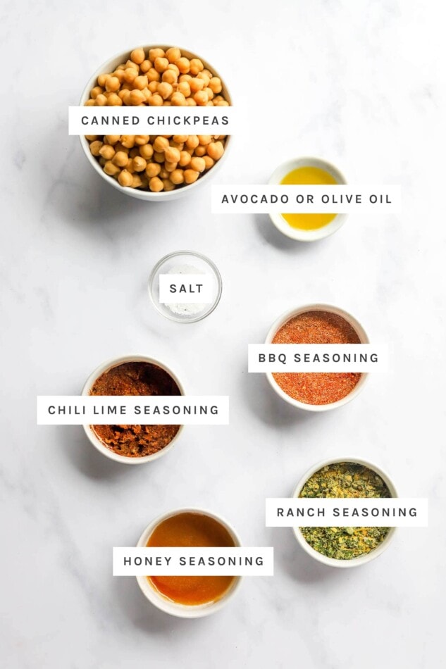 Ingredients measured out to make air fryer chickpeas: canned chickpeas, olive oil, salt, bbq seasoning, chili lime seasoning, ranch seasoning and honey seasoning.