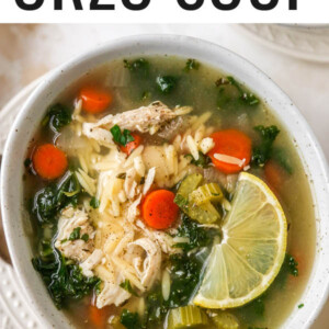 A bowl of lemon chicken orzo soup.