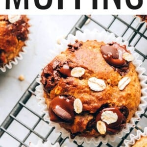 An overhead photo looking at an oatmeal banana muffin on a wire cooling rack.