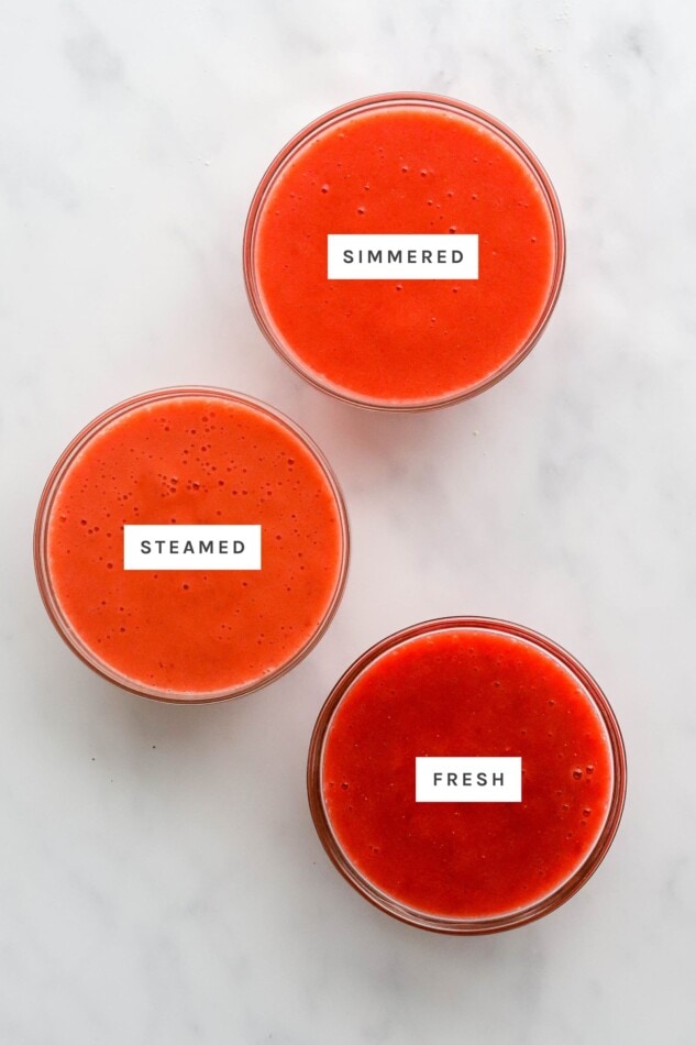 Three jars of strawberry puree with labels of how the berries were cooked: simmered, steamed and fresh.