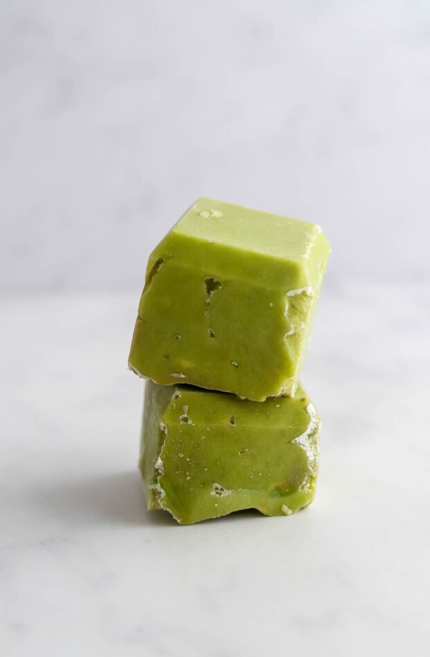 https://www.eatingbirdfood.com/wp-content/uploads/2022/02/avocado-puree-frozen-cubes-621x950.jpg