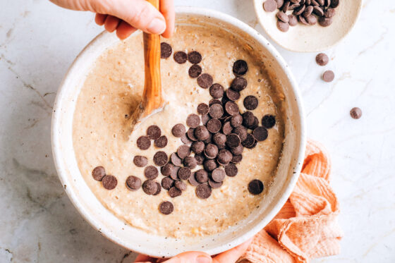 Chocolate chips added to the muffin batter.