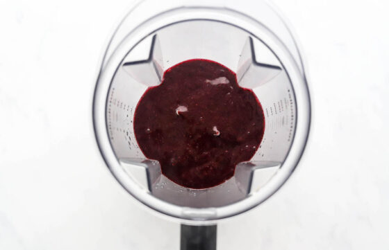 Blueberry puree in a blender.