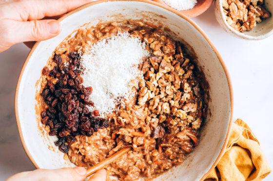 Raisins, shredded coconut and walnuts added to muffin batter.