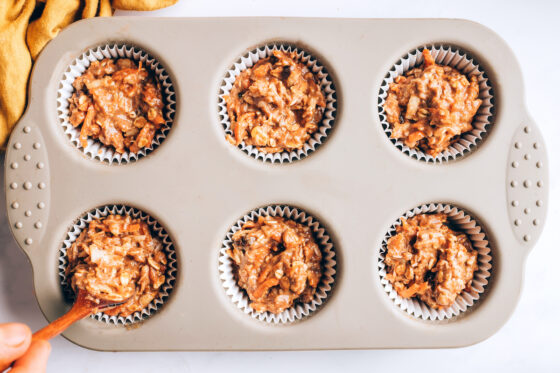 Muffins batter added to 6 paper lined muffin tin.