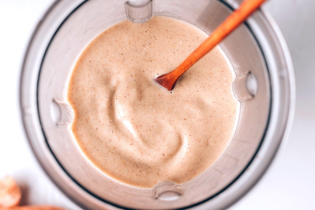 Oatmeal smoothie blended in a blender.