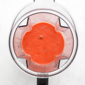 Steamed strawberry puree in a blender.