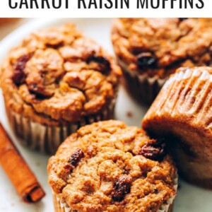 Carrot raisin muffins on a plate.