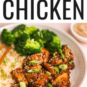 Sesame chicken served on a plate with rice and broccoli.