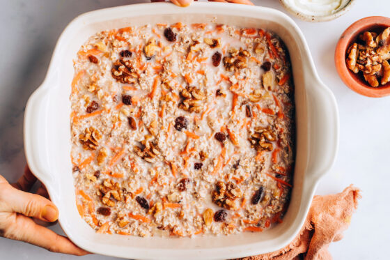 Ingredients for carrot bake baked oatmeal in a baking dish.