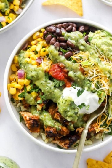 cropped-chicken-burrito-bowl-overhead-closeup-with-spoon.jpg