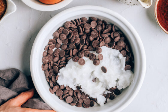 Chocolate chips and coconut oil in a saucepan.