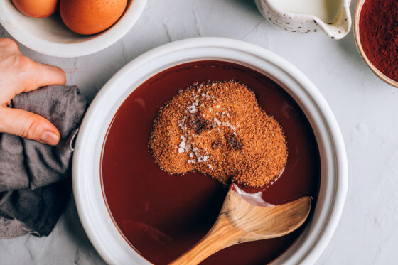 Coconut sugar, salt and vanilla added to the melted chocolate and coconut oil in a suacepan.