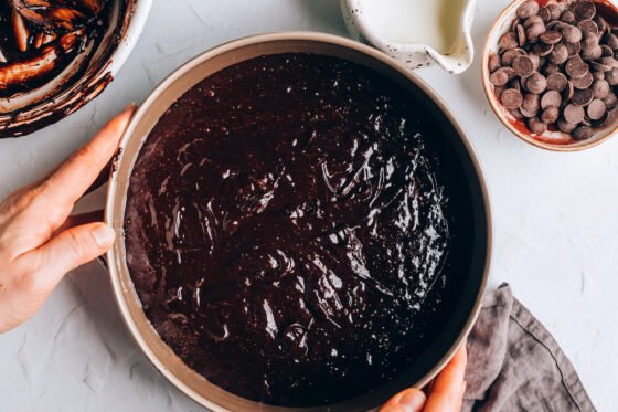 Chocolate mixture in a greased pan.