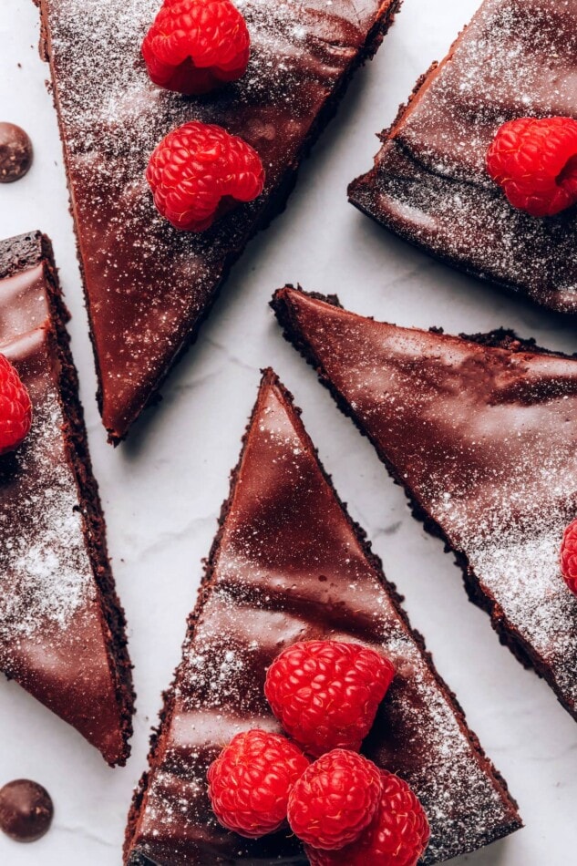 Overhead view of slices of flourless chocolate cake.