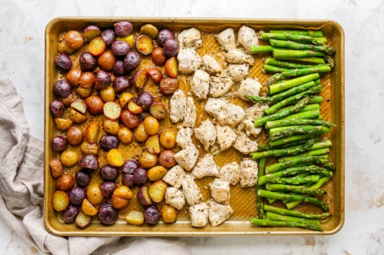 Lemon Garlic Chicken Sheet Pan Meal after roasting on a sheet pan.