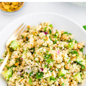 Quinoa Jennifer Aniston salad on a white plate.