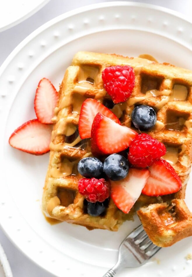 Close up of berries on an almond flour waffle.